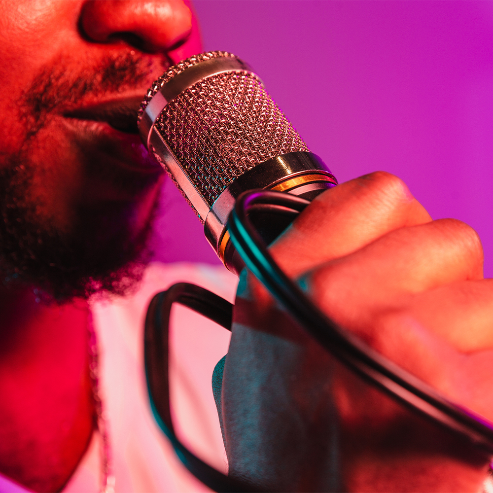 Man speaking into microphone